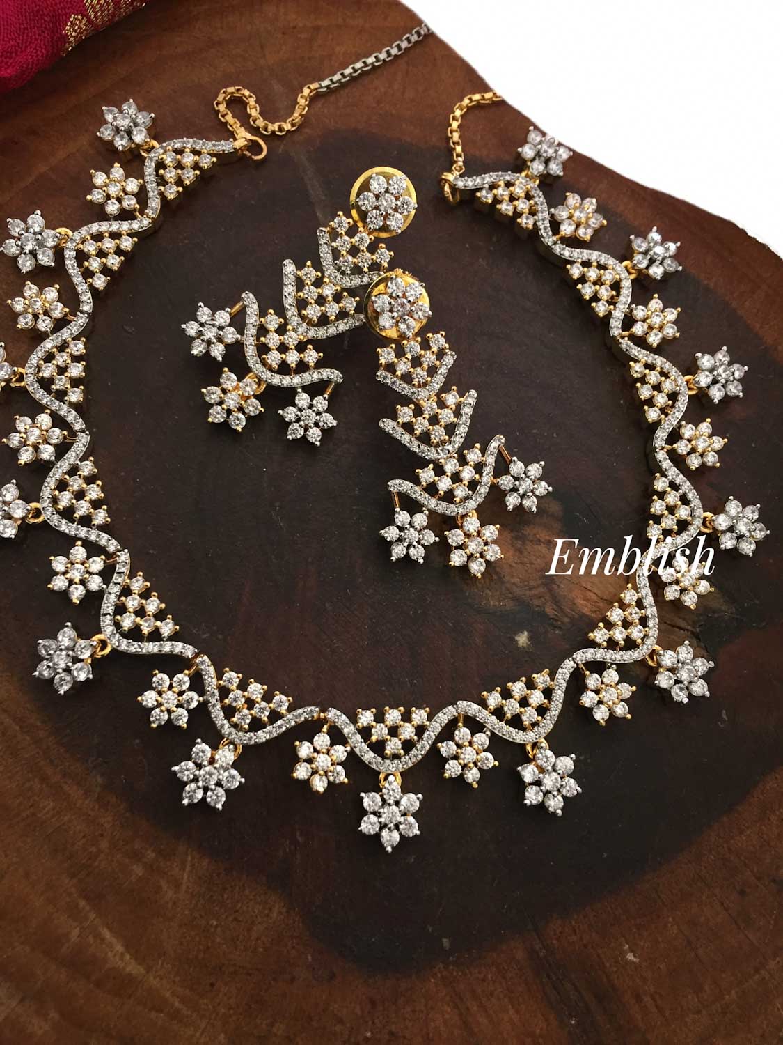 Ad stones Gold tone up down flower neckpiece 